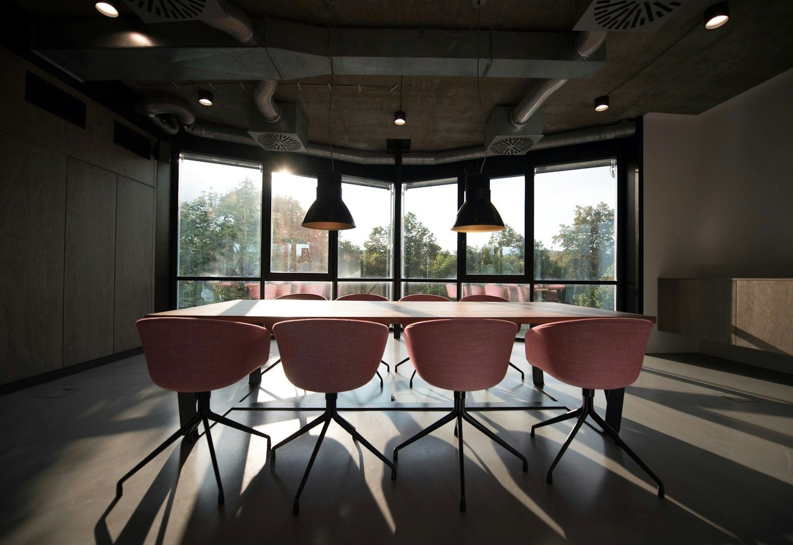 Contemporary meeting room with floor-to-ceiling windows